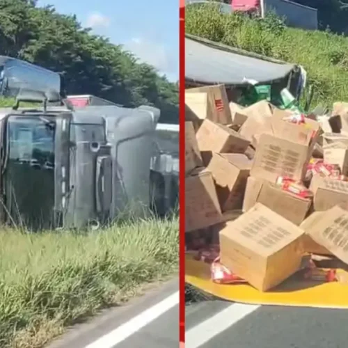 Carreta carregada com biscoitos tomba na BR-324 e carga é saqueada por populares